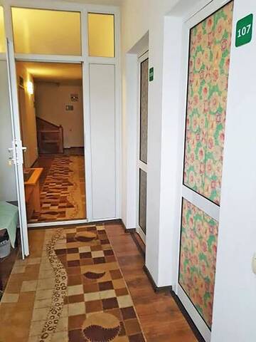 Фото номера Апартаменты с 2 спальнями Гостевой дом Pensiunea Agroturistica Piscul Soarelui г. Кымпулунг 10